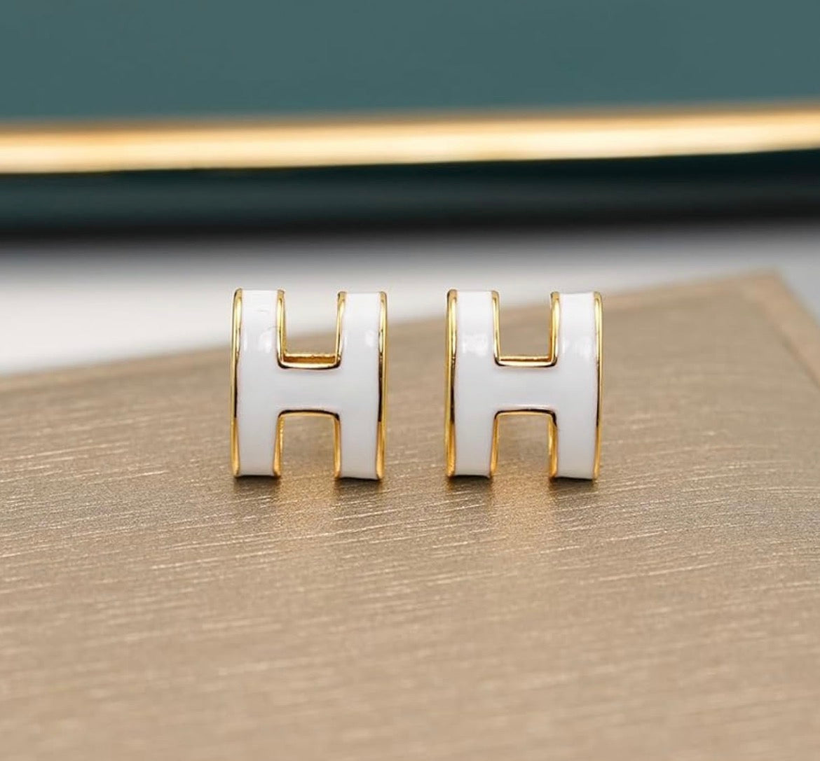 White And Gold Hermes H Earrings