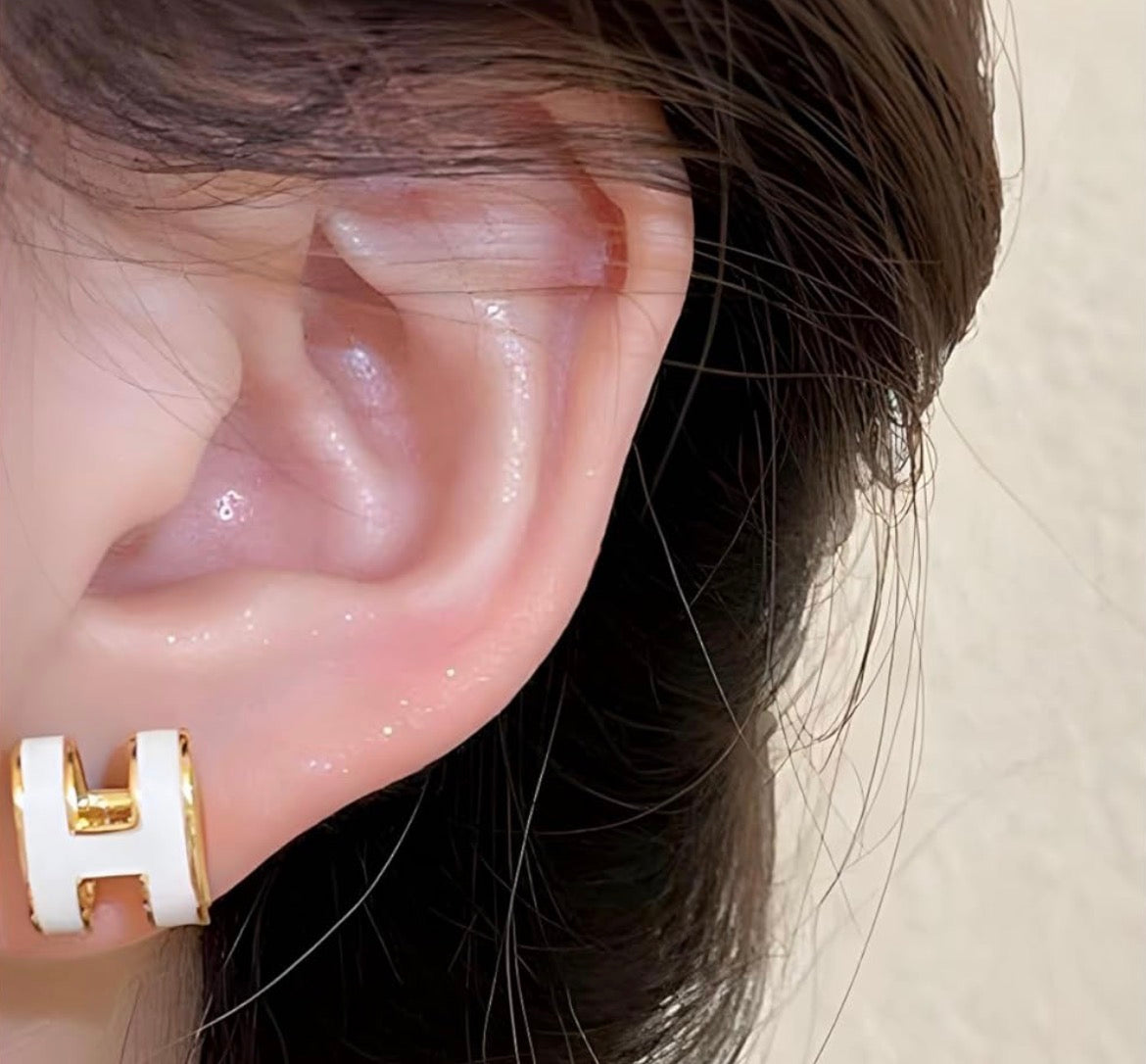White And Gold Hermes H Earrings